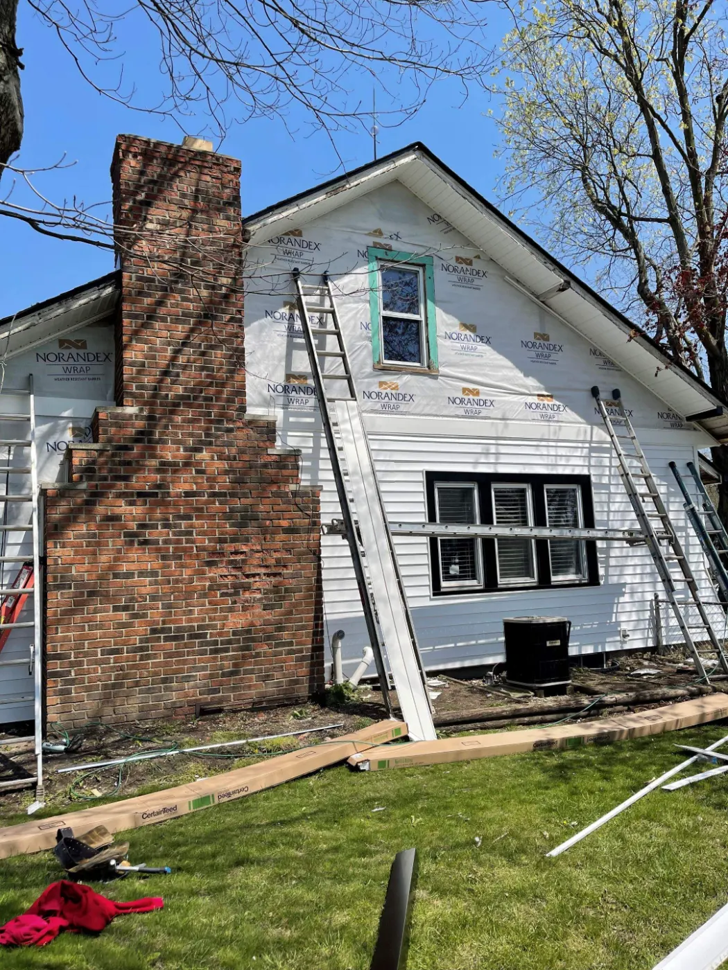 Storm-damaged siding documented in Rocky Ripple